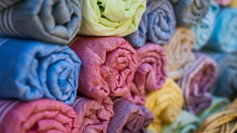 Picture of multicoloured rolls of towel material