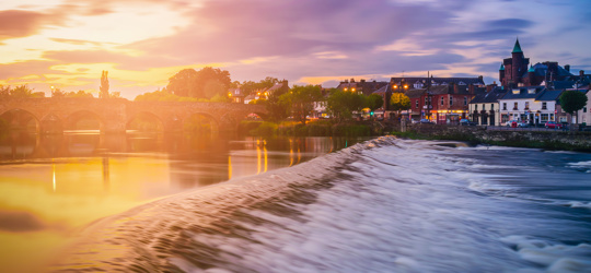 The River Nith and old bridge at sunset in Dumfries, Scotland, UK