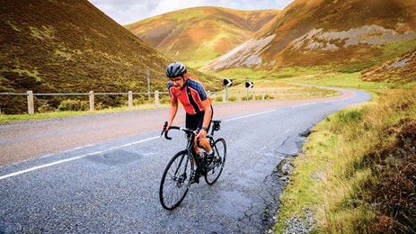 Cyclist on the Mennock Pass, Dumfries and Galloway