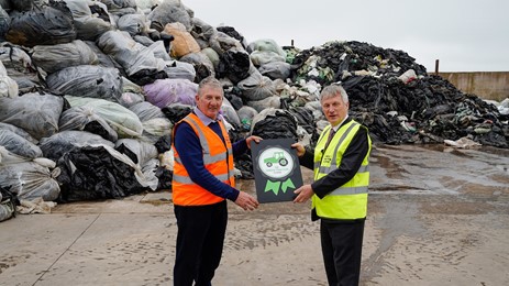 Roy Hiddleston of Solway Recycling and Ivan McKee with the company's national farmers green scheme